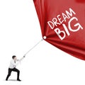 European businessman pull text of dream big