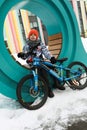 European child rides a rented bicycle Royalty Free Stock Photo