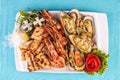 Fried fish, king prawns with lemon, mussels with oyster sauce, colmar rings, crab meat Royalty Free Stock Photo