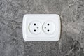 European electric outlet on tiled wall