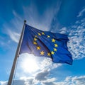 European EU flag, unfurled in all its glory on a sunny day against the clear blue sky. Royalty Free Stock Photo