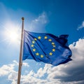 European EU flag, unfurled in all its glory on a sunny day against the clear blue sky. Royalty Free Stock Photo