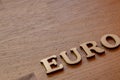 euro word concept made of wooden letters euro on wooden background