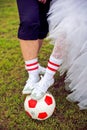 European Football Championship concept. Bride and groom on the football stadium. Royalty Free Stock Photo