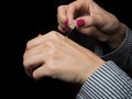 European hands of a woman with Arabian perfume oil Royalty Free Stock Photo