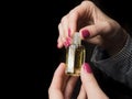 European hands of a woman with Arabian perfume oil Royalty Free Stock Photo