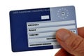 European health insurance card held in hand close up on white background