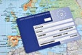 European health insurance card lying on a map of Europe close up