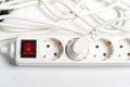 European household white extension cord for 220v with fuse on white textile