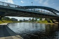 European iron road bridge over the river. the city center. summer sunny day vilnius lithuania July 23 2022 Royalty Free Stock Photo