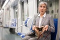 Senior woman was robbed in subway train Royalty Free Stock Photo