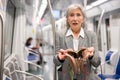 Senior woman was robbed in subway train Royalty Free Stock Photo