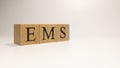 European Monetary System ,EMS, its name was created from wooden letter cubes.