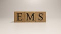 European Monetary System ,EMS, its name was created from wooden letter cubes.