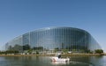 European Parliament facade building with Police Gendarmerie boat