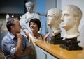 European pensioner family visiting historical exhibition in National Museum