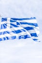 Greek flag and cloudy sky in summer day, politics of Europe