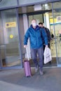 European redbeard man is in protective medical mask in airport