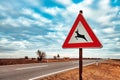 European road caution sign deer crossing Royalty Free Stock Photo