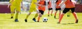 European soccer match between youth teams. Young school boys playing a soccer game Royalty Free Stock Photo