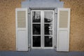 Old window with white wooden shutters Royalty Free Stock Photo