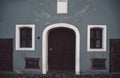 European style facade with rolling shutter on windows