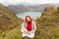 European Tourist Resting At Lake Quilotoa