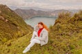 European Tourist Resting At Quilotoa Lake, Ecuador Royalty Free Stock Photo