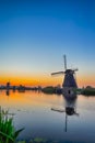 European Travel Destinations. Traditional Romantic Dutch Windmills in Kinderdijk Village in the Netherlands During Golden Hour Royalty Free Stock Photo