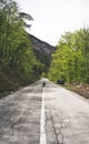 European traveler woman using smartphone taking pictures road countryside and natural on summer day. Traveler, holiday, vacation Royalty Free Stock Photo