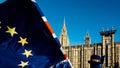 European Union and British Union Jack flag flying in front of Houses of Parliament at Westminster Palace, London, in Royalty Free Stock Photo