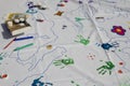 European union countries names and children handprints painted with colorful markers on white background