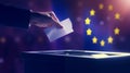 2024 European Union elections concept with European flag on background. A hand inserts the ballot into the ballot box. Royalty Free Stock Photo