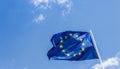 European Union EU flag against a blue sky. Soon there will be one less star since the UK voted to leave the EU in 2016, Royalty Free Stock Photo