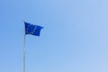 European Union EU flag is flying on blue sky background. Banner, place for text Royalty Free Stock Photo