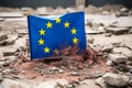 European Union flag in the middle of ruins and destruction, war and destruction concept Royalty Free Stock Photo