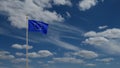 European Union flag waving in wind with blue sky. Europe banner silk blowing Royalty Free Stock Photo