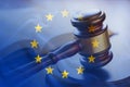 European Union flag with wooden gavel in close-up Royalty Free Stock Photo