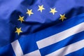 European Union and Greece. The concept of relationship between EU and Greece. Waving flag of EU and Greece Royalty Free Stock Photo