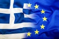 European Union and Greece. The concept of relationship between EU and Greece. Waving flag of EU and Greece. Royalty Free Stock Photo