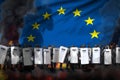 European Union protest fighting concept, police guards in heavy smoke and fire protecting law against disorder - military 3D