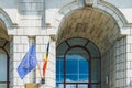 European Union and Romania flags on the wall