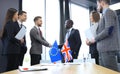 European Union and United Kingdom leaders shaking hands on a deal agreement. Brexit. Royalty Free Stock Photo