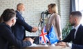 European Union and United Kingdom leaders shaking hands on a deal agreement. Brexit Royalty Free Stock Photo