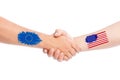 European Union and USA hands shaking with flags Royalty Free Stock Photo