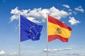 European Union vs Spain. Thick colored silky flags of European Union and Spain. 3D illustration on sky background. - Illustration Royalty Free Stock Photo