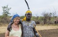 European woman and man from Mursi tribe in Mirobey village. Mago National Park. Omo Valley. Ethiopia