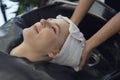 Woman hairdresser in beauty salon cut hair and hair design Royalty Free Stock Photo