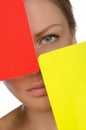 European young woman with red and yellow card Royalty Free Stock Photo