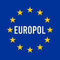 Europol sign with the European flag